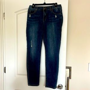 Cabi destressed/destructed jean in medium denim. Size 10 curvy skinny.